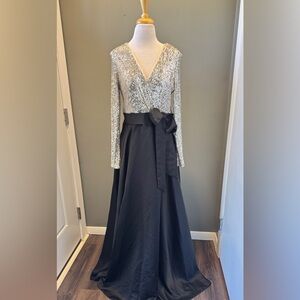 Xscape Silver Sequin Bodice with Black Satin Skirt Long Sleeve Gown